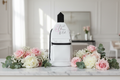 Sling Bag on Counter with Flowers